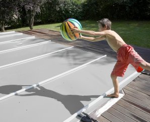 Bâche de sécurité à barres pour piscine en bois WEVA