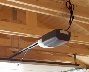 Moteur pour porte de garage sectionnelle